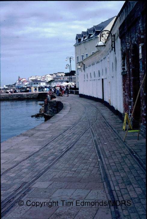 Remains of 2ft 6in gauge Swanage Pier Railway on the quayside