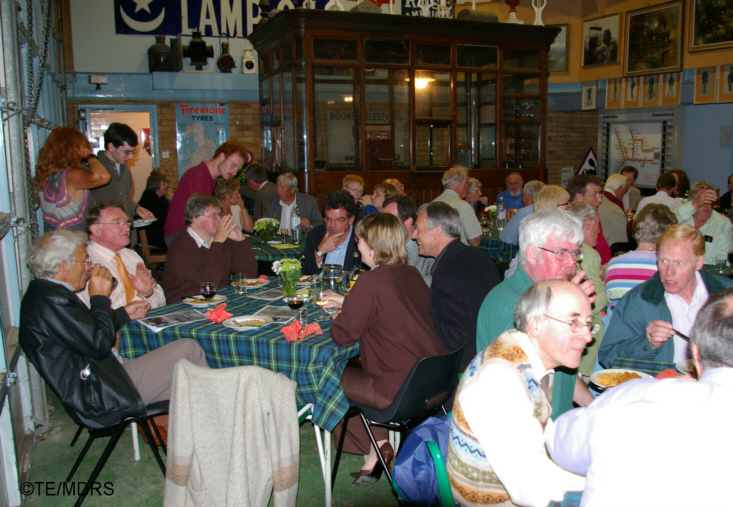 Members enjoy refreshments in the museum setting